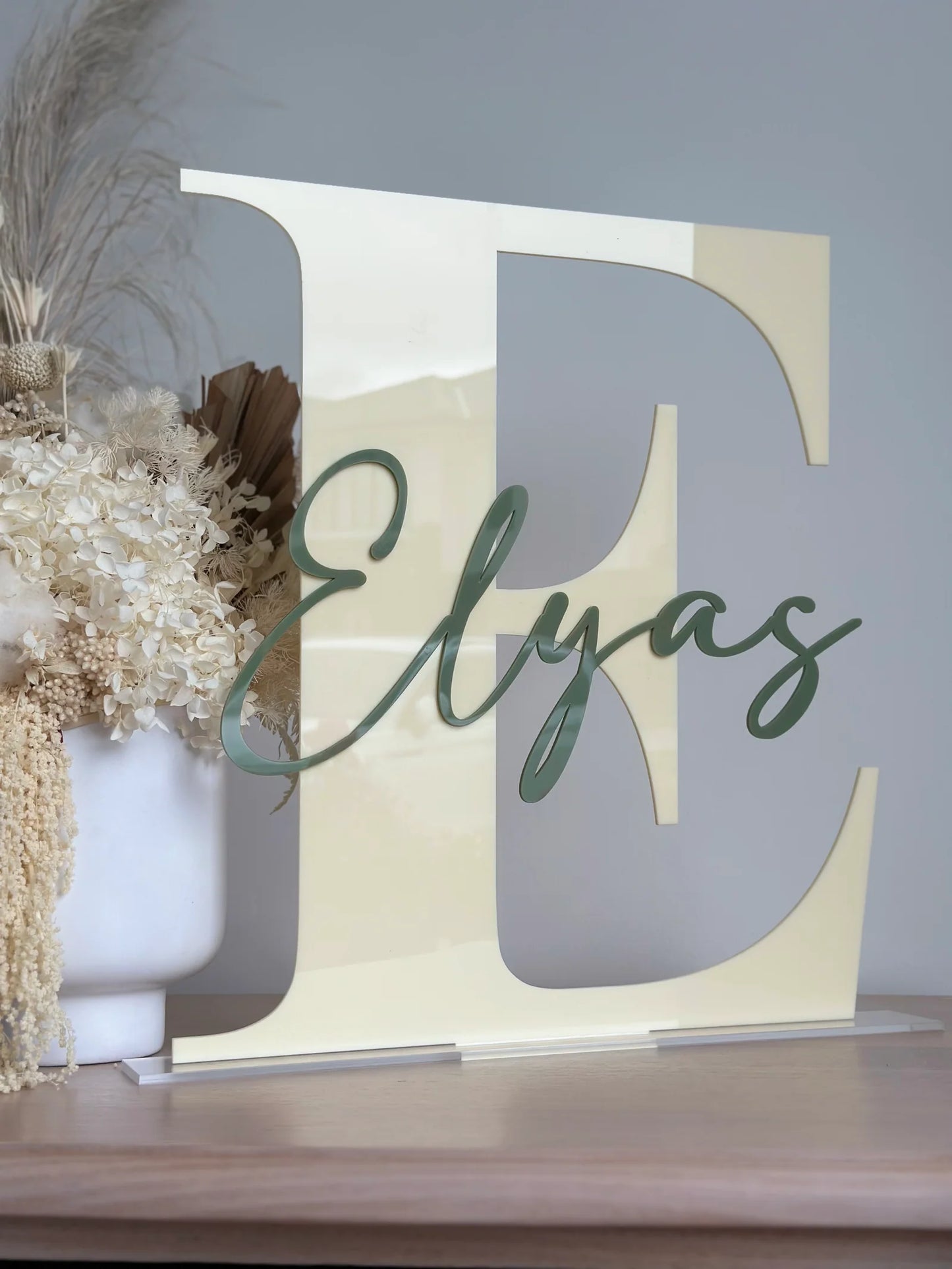 Two layered initial name sign